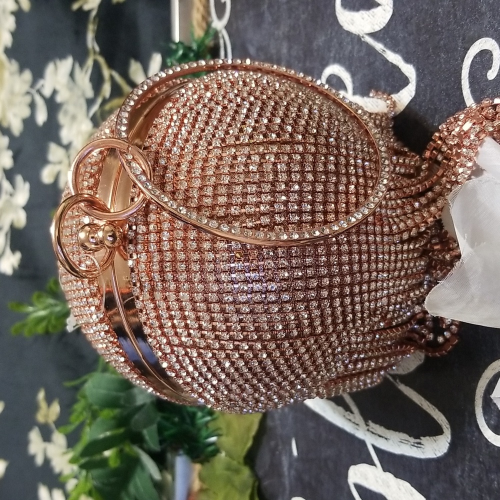 Akira disco drip ball purse rose gold new without tags has 22.5" rosegol…